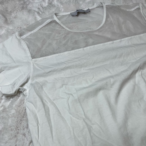 White adidas work out active shirt with mesh on the top and bottom. - Picture 2 of 8